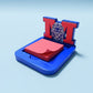 Xpress It Graphics blue and red 3D printed sticky note holder with Monarch M and lion logo. Holds a stack of pink sticky notes.